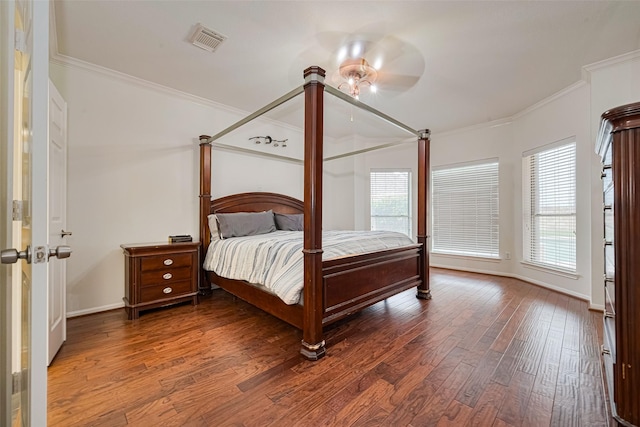 10818 Kleberg Place Dr, Houston, TX 77064 - bedroom with crown molding, wood finished floors, and ceiling fan
