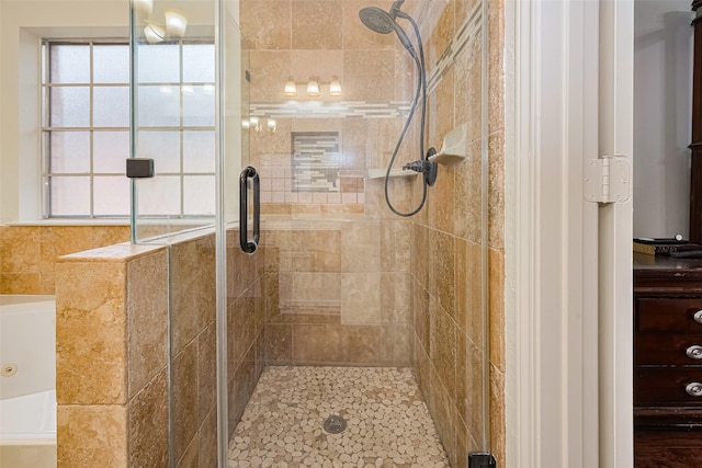 10818 Kleberg Place Dr, Houston, TX 77064 - bathroom featuring a bath and a shower stall
