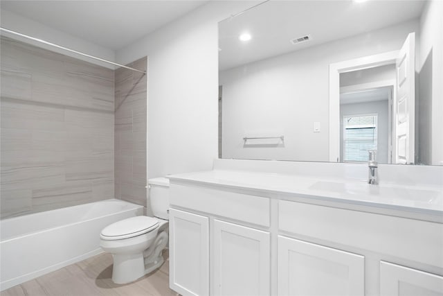 304 E Tranquil Fields Ln, Waller, TX 77484 - bathroom featuring vanity, bathing tub / shower combination, wood finished floors, and recessed lighting