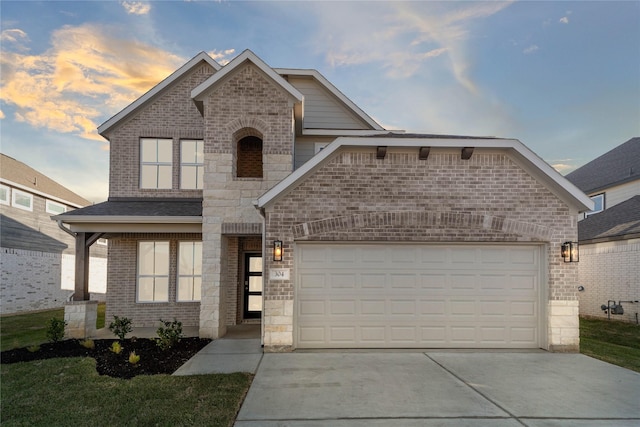 304 E Tranquil Fields Ln, Waller, TX 77484 - french provincial home featuring driveway, brick siding, and a garage