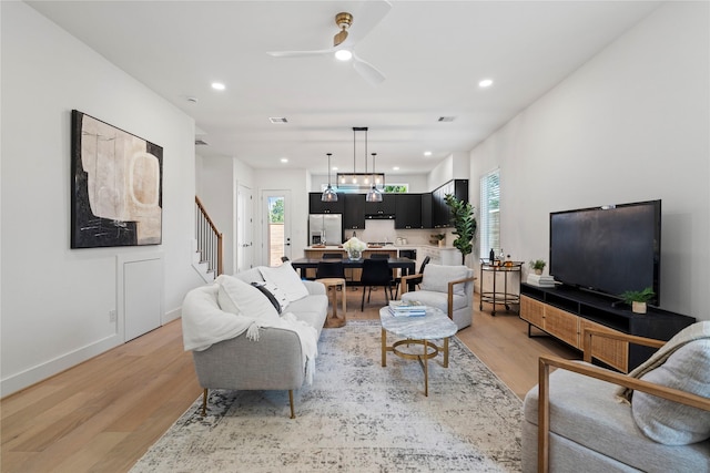 4110 Cortlandt St, Houston, TX 77018 - living area with stairs, light wood-style flooring, recessed lighting, a ceiling fan, and healthy amount of natural light