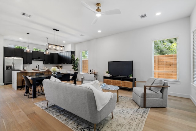 4110 Cortlandt St, Houston, TX 77018 - living room with light wood-style flooring, recessed lighting, and a ceiling fan