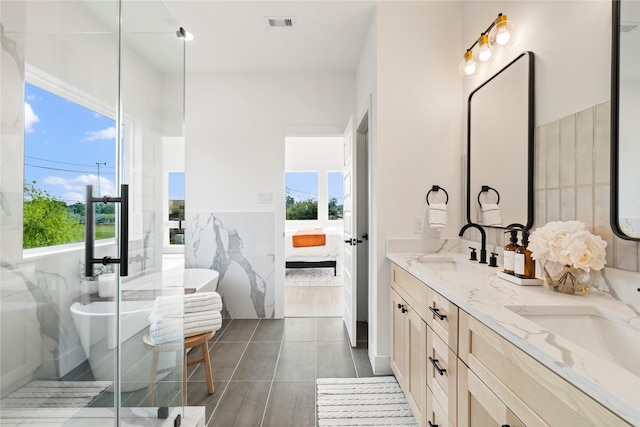 4110 Cortlandt St, Houston, TX 77018 - full bath with double vanity, a freestanding tub, ensuite bath, and a stall shower