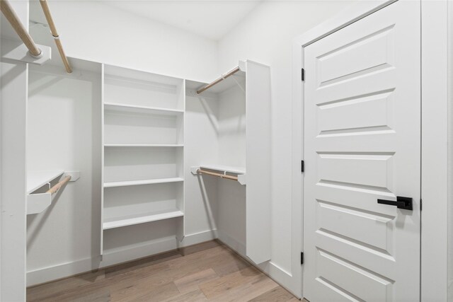 4110 Cortlandt St, Houston, TX 77018 - walk in closet with light wood-type flooring