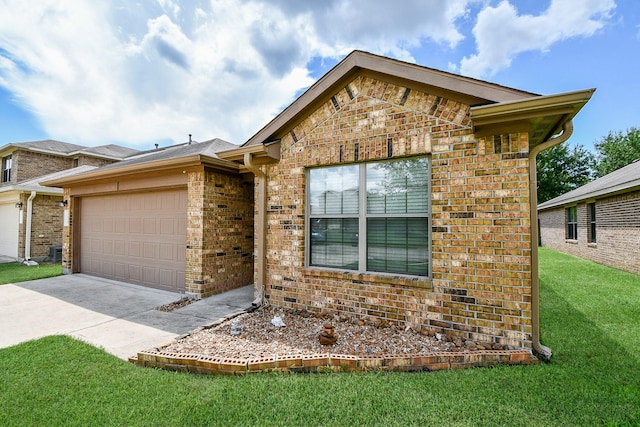 2026 Naplechase Crest Dr, Spring, TX 77373 - view of front of home with a garage, brick siding, concrete driveway, and a front lawn