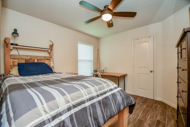 2026 Naplechase Crest Dr, Spring, TX 77373 - bedroom with dark wood-type flooring and a ceiling fan