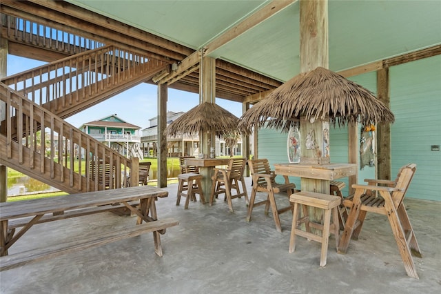 2617 Breaker Dr, Port Bolivar, TX 77650 - view of patio with outdoor dining area and stairs