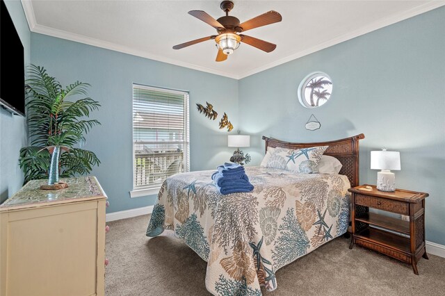 2617 Breaker Dr, Port Bolivar, TX 77650 - bedroom with light carpet, ornamental molding, and ceiling fan