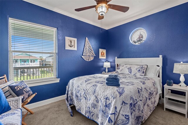 2617 Breaker Dr, Port Bolivar, TX 77650 - bedroom featuring carpet, crown molding, a textured wall, and a ceiling fan