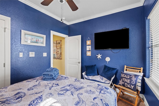 2617 Breaker Dr, Port Bolivar, TX 77650 - bedroom with a textured wall, crown molding, and a ceiling fan