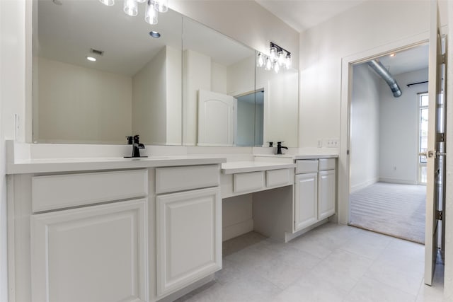 1616 Fountain View Dr Unit 202, Houston, TX 77057 - full bath with double vanity and tile patterned flooring