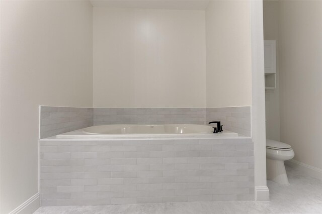 1616 Fountain View Dr Unit 202, Houston, TX 77057 - bathroom with a bath and tile patterned flooring