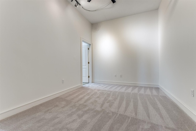 1616 Fountain View Dr Unit 202, Houston, TX 77057 - unfurnished room featuring light carpet and baseboards