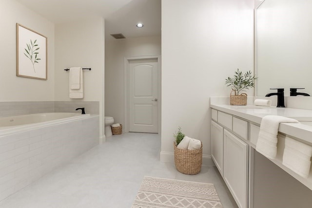 1616 Fountain View Dr Unit 202, Houston, TX 77057 - full bathroom featuring vanity, a bath, and recessed lighting