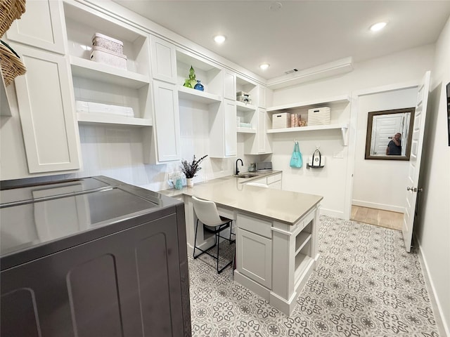 31306 Crescent Hill Dr, Fulshear, TX 77441 - office area with washing machine and clothes dryer and recessed lighting