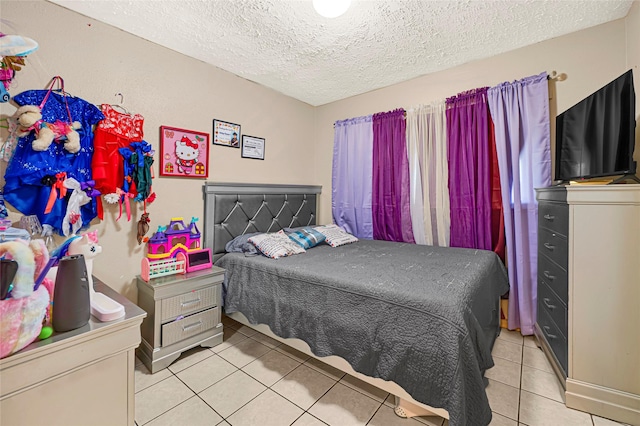 19330 Cypress Canyon Dr, Katy, TX 77449 - bedroom with light tile patterned flooring and a textured ceiling