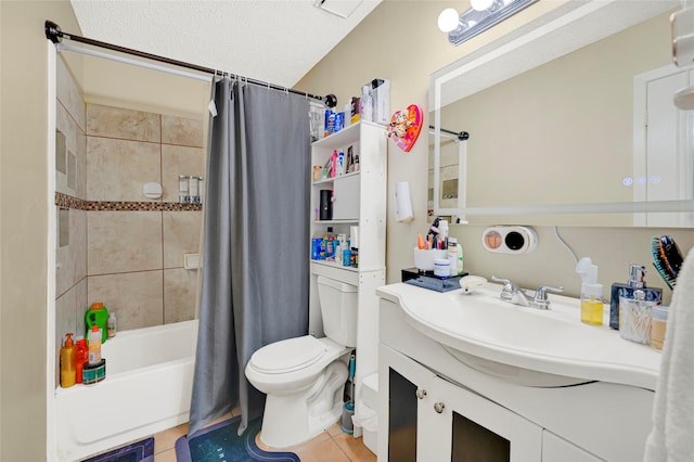 19330 Cypress Canyon Dr, Katy, TX 77449 - full bath featuring tile patterned flooring, vanity, shower / bath combo with shower curtain, and a textured ceiling