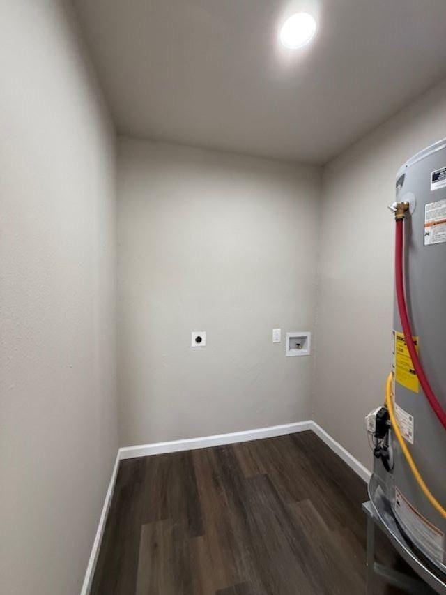 403 3rd St, Nederland, TX 77627 - laundry area featuring hookup for an electric dryer, dark wood-style floors, washer hookup, and water heater