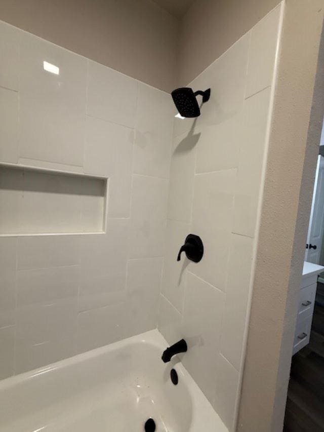 403 3rd St, Nederland, TX 77627 - bathroom featuring bathing tub / shower combination and vanity