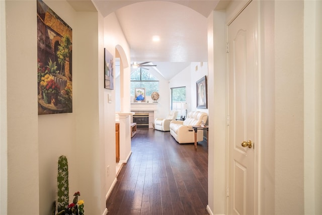 9434 Barretts Glen Ct, Houston, TX 77065 - corridor with arched walkways, dark wood-style floors, and lofted ceiling