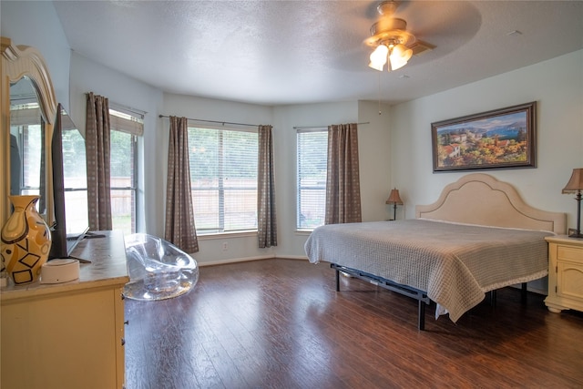 9434 Barretts Glen Ct, Houston, TX 77065 - bedroom with dark wood-type flooring and a ceiling fan