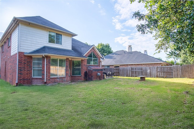 9434 Barretts Glen Ct, Houston, TX 77065 - rear view of property with brick siding and a fenced backyard