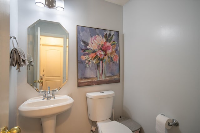 9434 Barretts Glen Ct, Houston, TX 77065 - bathroom with toilet and a sink