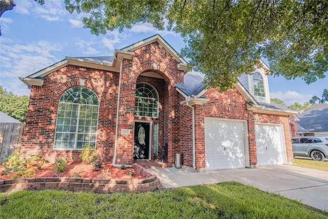 9434 Barretts Glen Ct, Houston, TX 77065 - traditional-style house featuring driveway, brick siding, and an attached garage