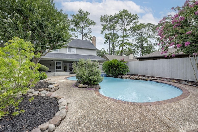 1109 Cheshire Ln, Houston, TX 77018 - view of swimming pool with a patio