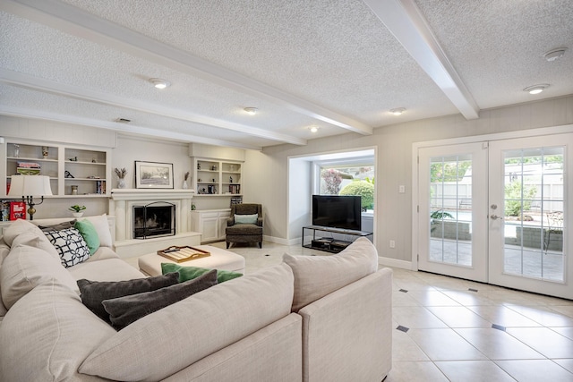 1109 Cheshire Ln, Houston, TX 77018 - living room with a textured ceiling, beam ceiling, light tile patterned flooring, french doors, and a fireplace with raised hearth