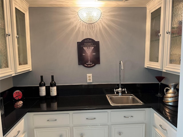 1109 Cheshire Ln, Houston, TX 77018 - kitchen with white cabinetry, dark countertops, and glass insert cabinets