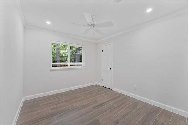 163 W Village Knoll Cir, The Woodlands, TX 77381 - spare room featuring ornamental molding, wood finished floors, a ceiling fan, and recessed lighting
