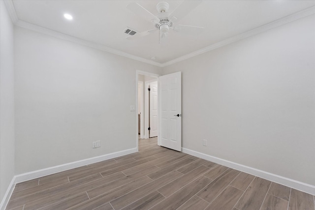 163 W Village Knoll Cir, The Woodlands, TX 77381 - empty room with wood finished floors, a ceiling fan, ornamental molding, and recessed lighting