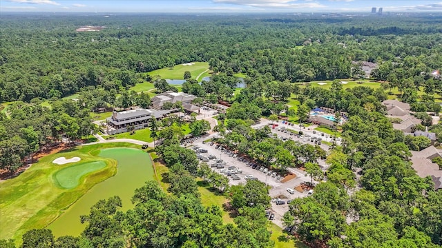 163 W Village Knoll Cir, The Woodlands, TX 77381 - bird's eye view of a heavily wooded area and a golf course