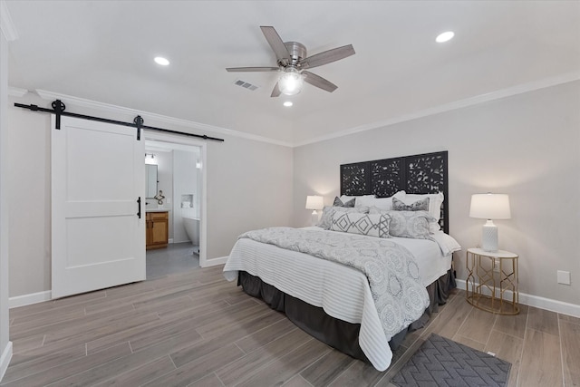 163 W Village Knoll Cir, The Woodlands, TX 77381 - bedroom with a barn door, wood finished floors, crown molding, recessed lighting, and a ceiling fan