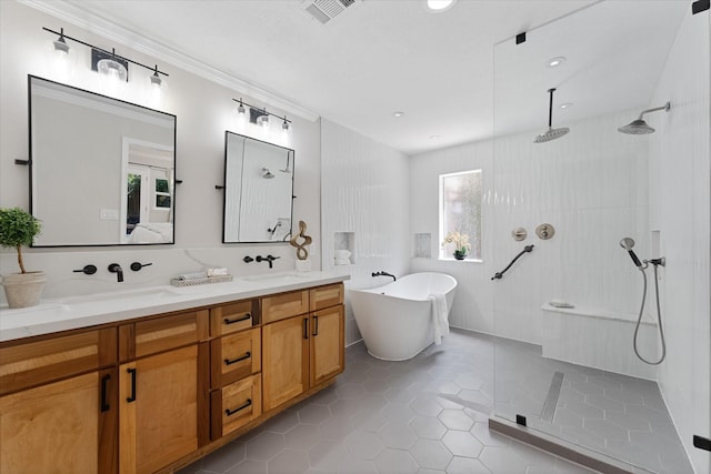 163 W Village Knoll Cir, The Woodlands, TX 77381 - full bath with a walk in shower, tile patterned flooring, double vanity, a soaking tub, and recessed lighting