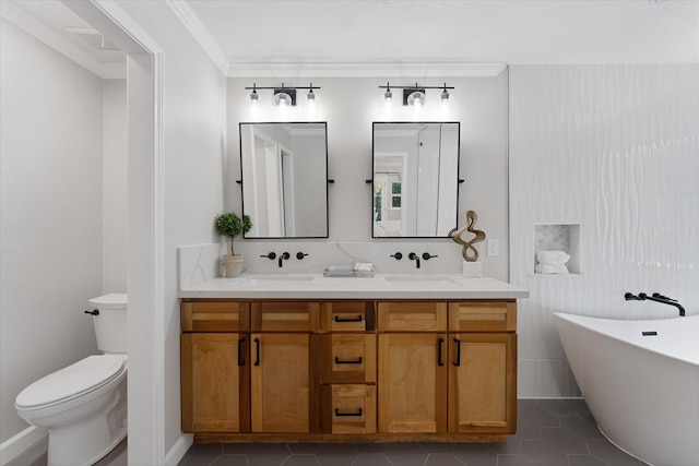 163 W Village Knoll Cir, The Woodlands, TX 77381 - bathroom with double vanity, a freestanding bath, crown molding, and tile patterned flooring