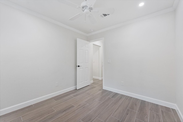 163 W Village Knoll Cir, The Woodlands, TX 77381 - unfurnished room with wood finished floors, ceiling fan, ornamental molding, and recessed lighting