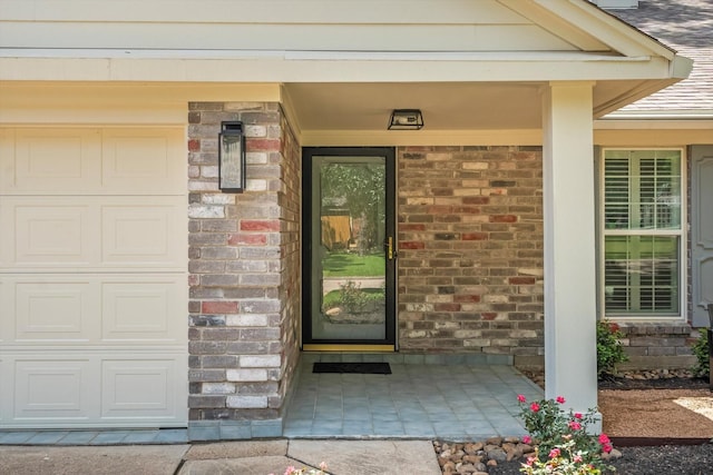 163 W Village Knoll Cir, The Woodlands, TX 77381 - entrance to property featuring brick siding and covered porch