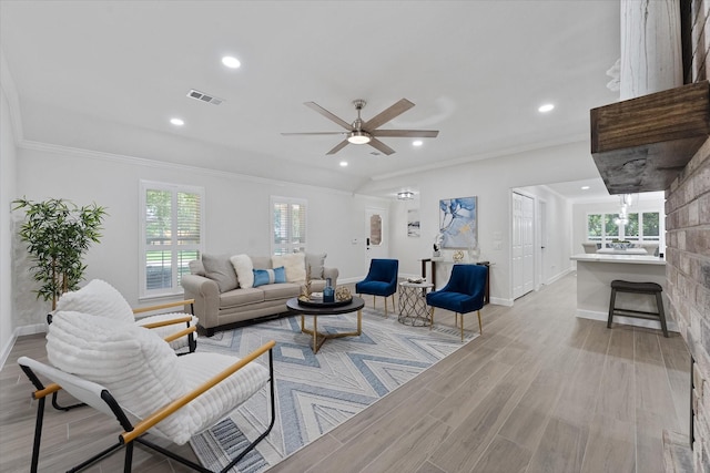 163 W Village Knoll Cir, The Woodlands, TX 77381 - living area with wood finished floors, a ceiling fan, recessed lighting, and crown molding