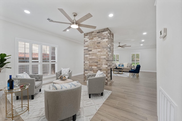 163 W Village Knoll Cir, The Woodlands, TX 77381 - living area with a ceiling fan, crown molding, recessed lighting, and light wood finished floors