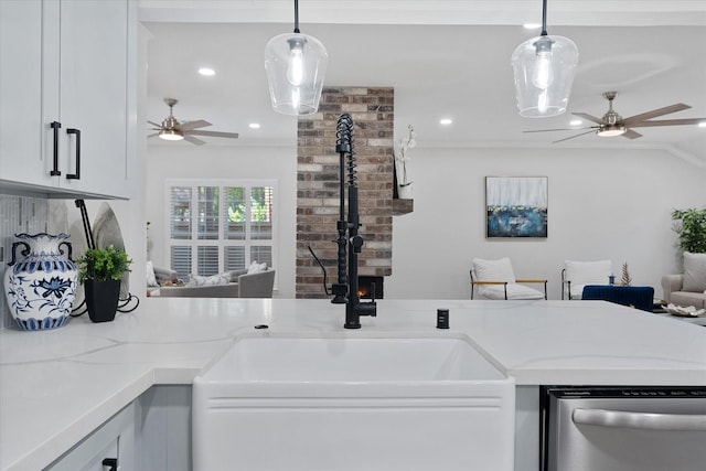 163 W Village Knoll Cir, The Woodlands, TX 77381 - kitchen featuring ceiling fan, stainless steel dishwasher, open floor plan, white cabinetry, and hanging light fixtures