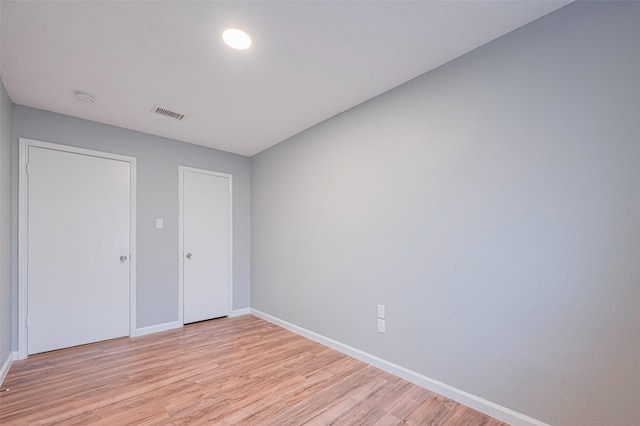 6452 Kentwick Dr, Houston, TX 77084 - unfurnished bedroom featuring light wood finished floors and baseboards