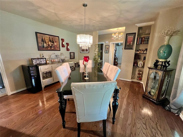 51 S Trillium Ct, Lake Jackson, TX 77566 - dining room featuring a chandelier and dark wood-style floors