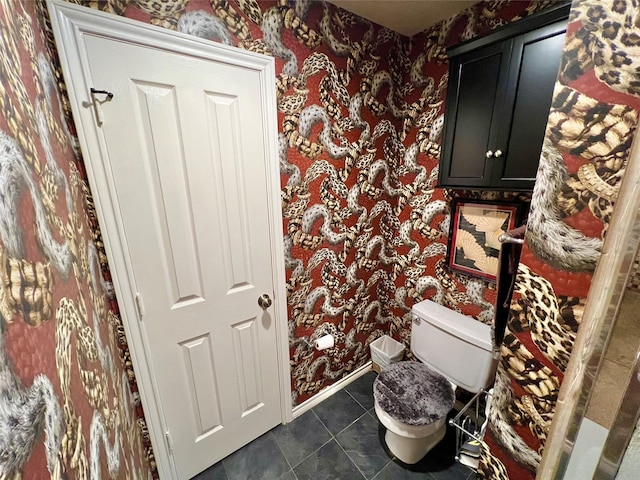 51 S Trillium Ct, Lake Jackson, TX 77566 - half bath with wallpapered walls and tile patterned floors