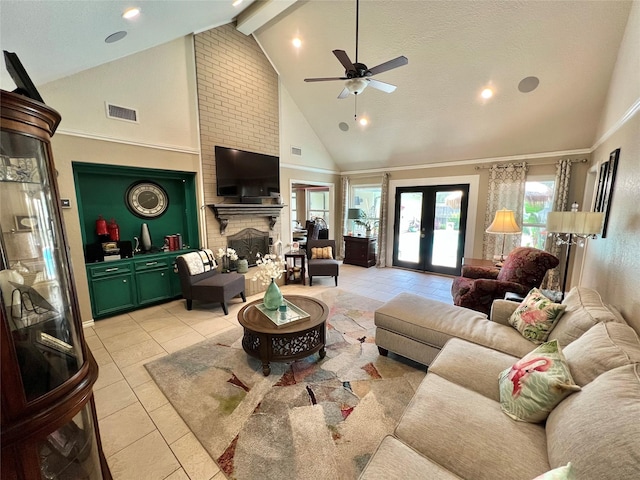 51 S Trillium Ct, Lake Jackson, TX 77566 - living room with high vaulted ceiling, ceiling fan, beamed ceiling, a fireplace, and light tile patterned flooring