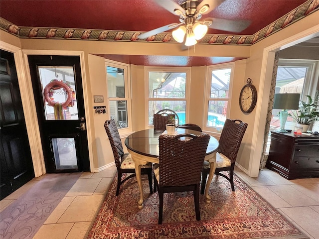51 S Trillium Ct, Lake Jackson, TX 77566 - dining space featuring light tile patterned floors and a ceiling fan