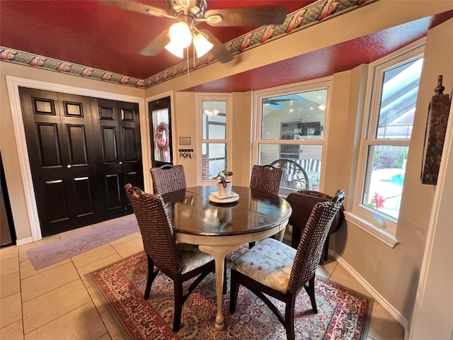 51 S Trillium Ct, Lake Jackson, TX 77566 - dining room with a ceiling fan and light tile patterned flooring