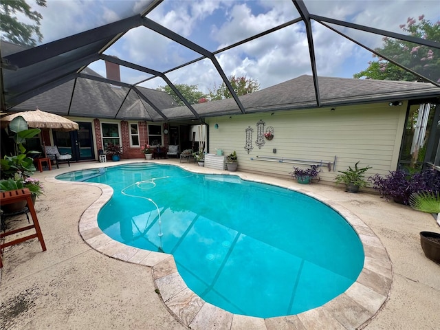 51 S Trillium Ct, Lake Jackson, TX 77566 - outdoor pool featuring a patio and a lanai