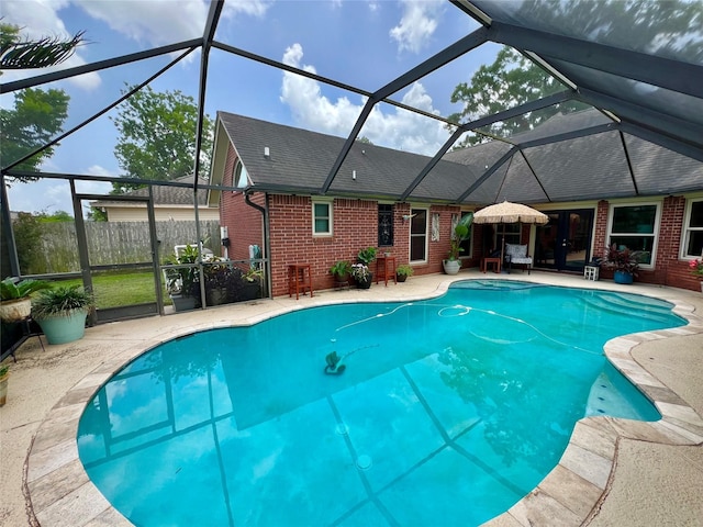 51 S Trillium Ct, Lake Jackson, TX 77566 - outdoor pool with a patio area and a lanai